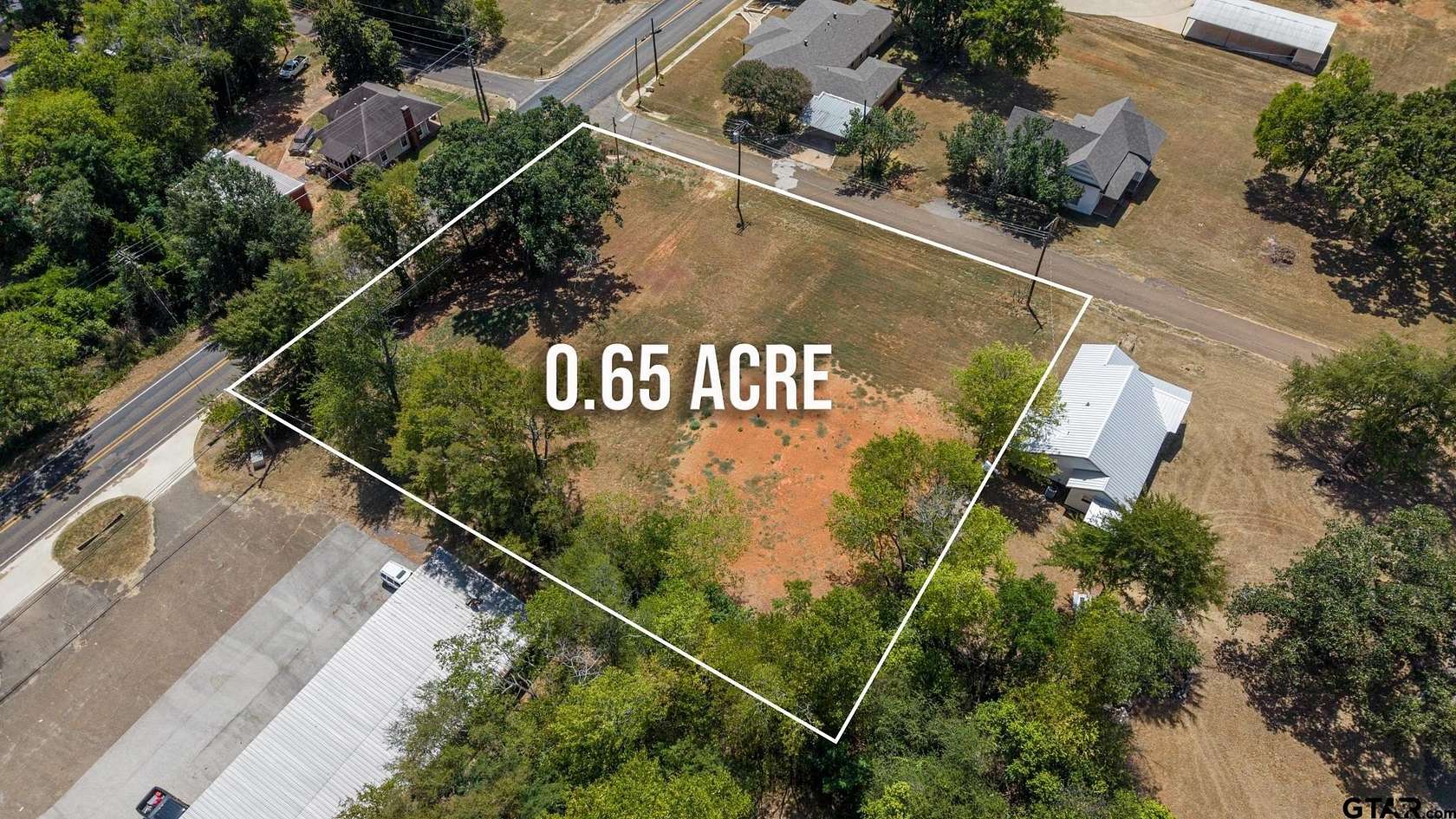 0.65 Acres of Mixed-Use Land for Sale in Hughes Springs, Texas