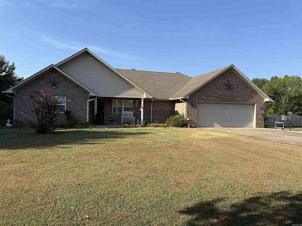 1.26 Acres of Land with Home for Sale in Quitman, Arkansas