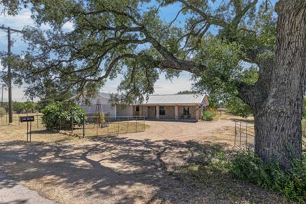 7 Acres of Land with Home for Sale in Marble Falls, Texas