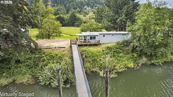 2.44 Acres of Land with Home for Sale in Mapleton, Oregon
