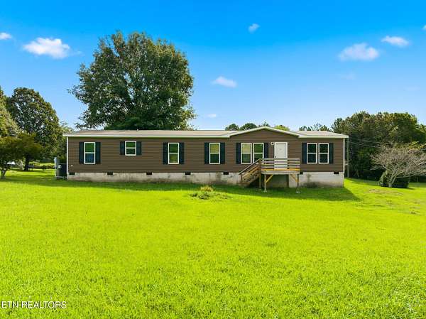 1.83 Acres of Land with Home for Sale in Madisonville, Tennessee