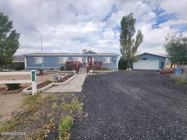 4.8 Acres of Land with Home for Sale in Silver Springs, Nevada