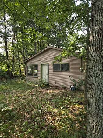 0.11 Acres of Land for Sale in Idlewild, Michigan