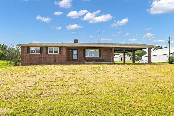 10.5 Acres of Land with Home for Sale in Central City, Kentucky