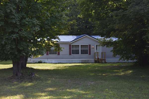 5 Acres of Land with Home for Sale in Mancelona, Michigan
