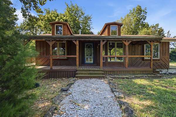 7.35 Acres of Land with Home for Sale in Morrisville, Missouri