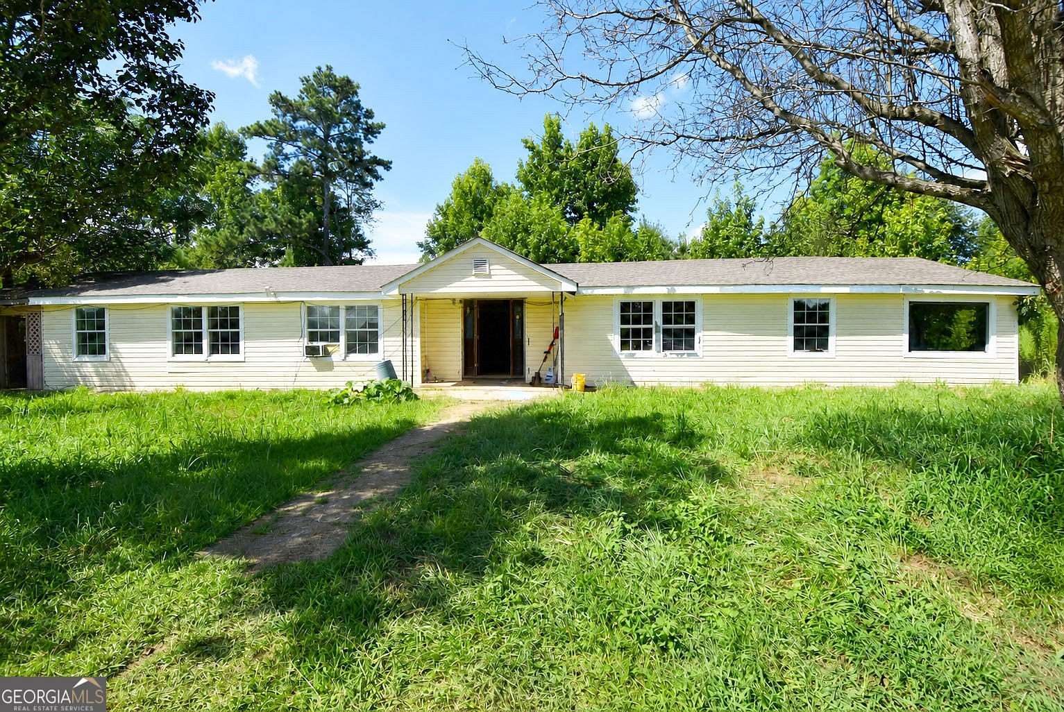 21.9 Acres of Land with Home for Sale in Hampton, Georgia