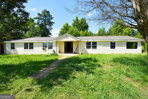 21.9 Acres of Land with Home for Sale in Hampton, Georgia