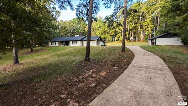 4 Acres of Land with Home for Sale in Atlanta, Texas