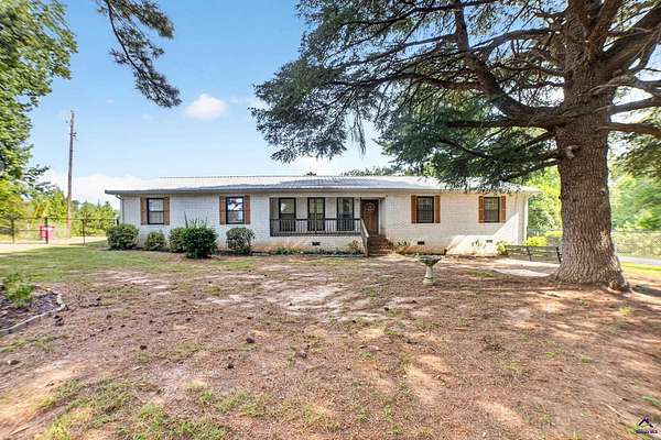 5.6 Acres of Land with Home for Sale in Macon, Georgia