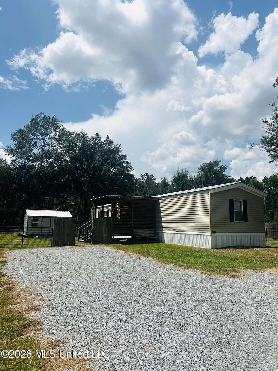 1.84 Acres of Land with Home for Sale in Kiln, Mississippi
