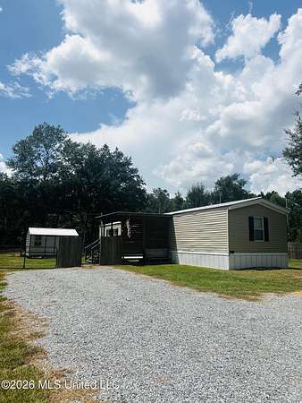 1.84 Acres of Land with Home for Sale in Kiln, Mississippi