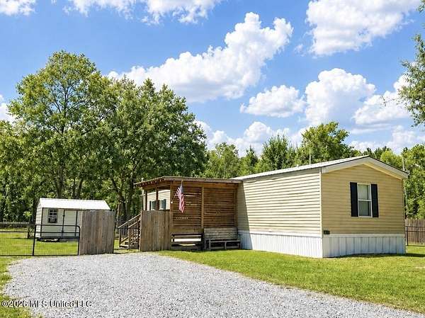 1.84 Acres of Land with Home for Sale in Kiln, Mississippi