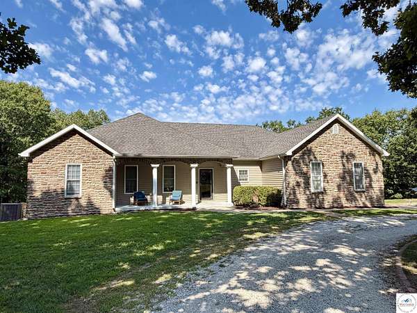 9.3 Acres of Land with Home for Sale in Warsaw, Missouri