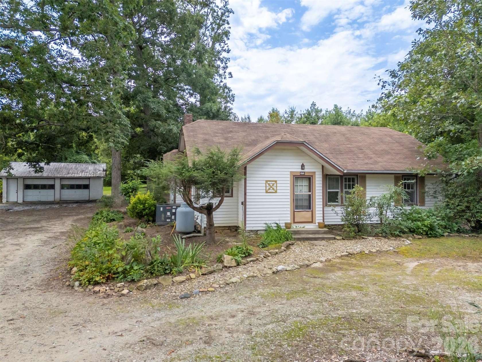 5.1 Acres of Land with Home for Sale in East Flat Rock, North Carolina