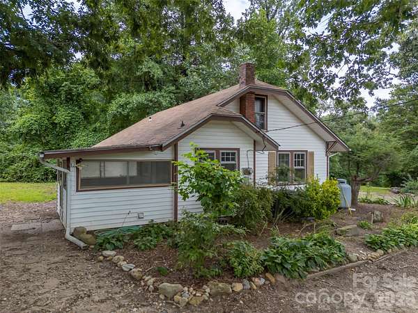 5.1 Acres of Land with Home for Sale in East Flat Rock, North Carolina