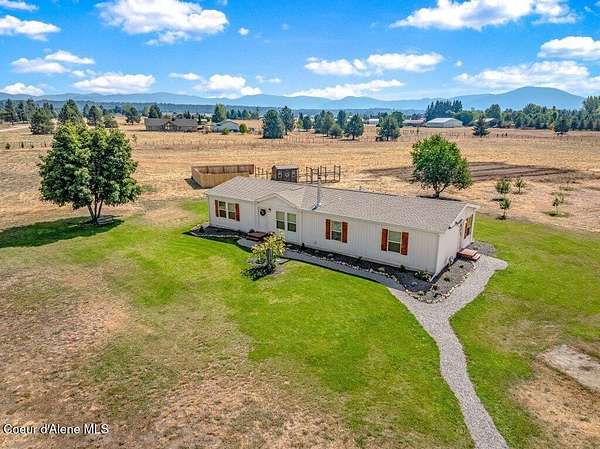 9.57 Acres of Land with Home for Sale in Rathdrum, Idaho