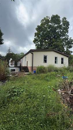 7.34 Acres of Land with Home for Sale in Pine Plains, New York