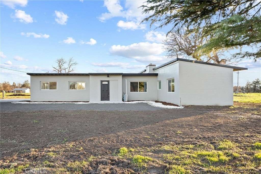 8.45 Acres of Land with Home for Auction in Los Molinos, California