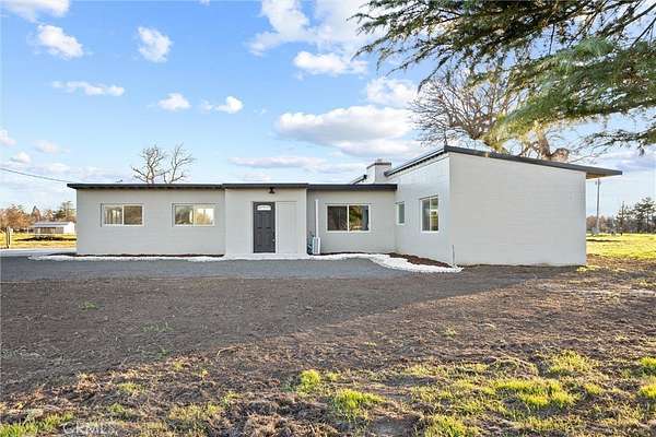8.45 Acres of Land with Home for Auction in Los Molinos, California