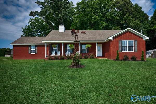 112 Acres of Land with Home for Sale in Minor Hill, Alabama