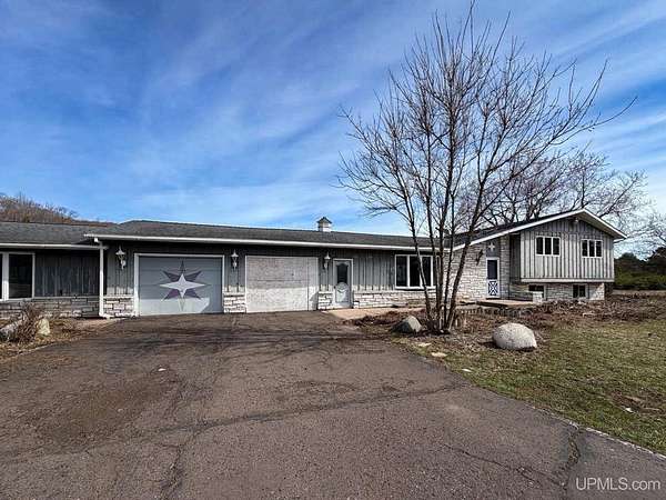 16.2 Acres of Land with Home for Sale in Bessemer, Michigan