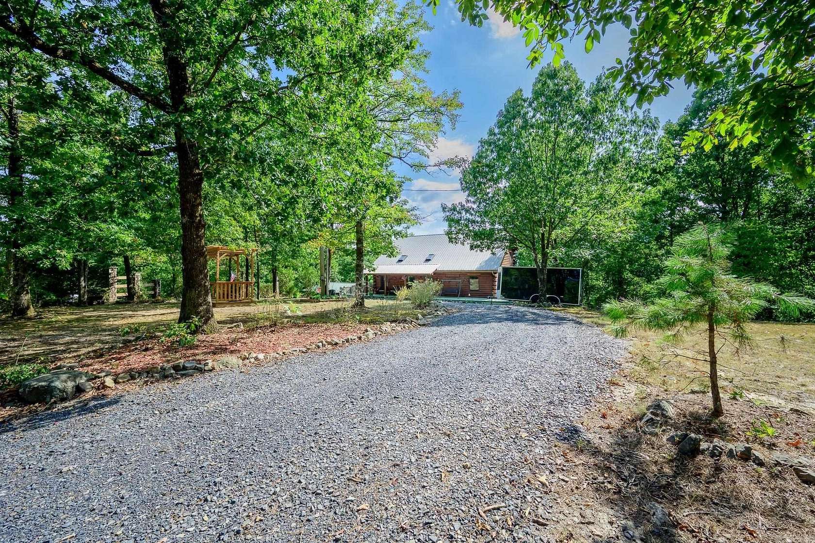 6.54 Acres of Land with Home for Sale in Mena, Arkansas