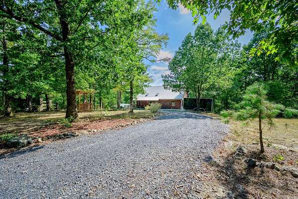 6.54 Acres of Land with Home for Sale in Mena, Arkansas