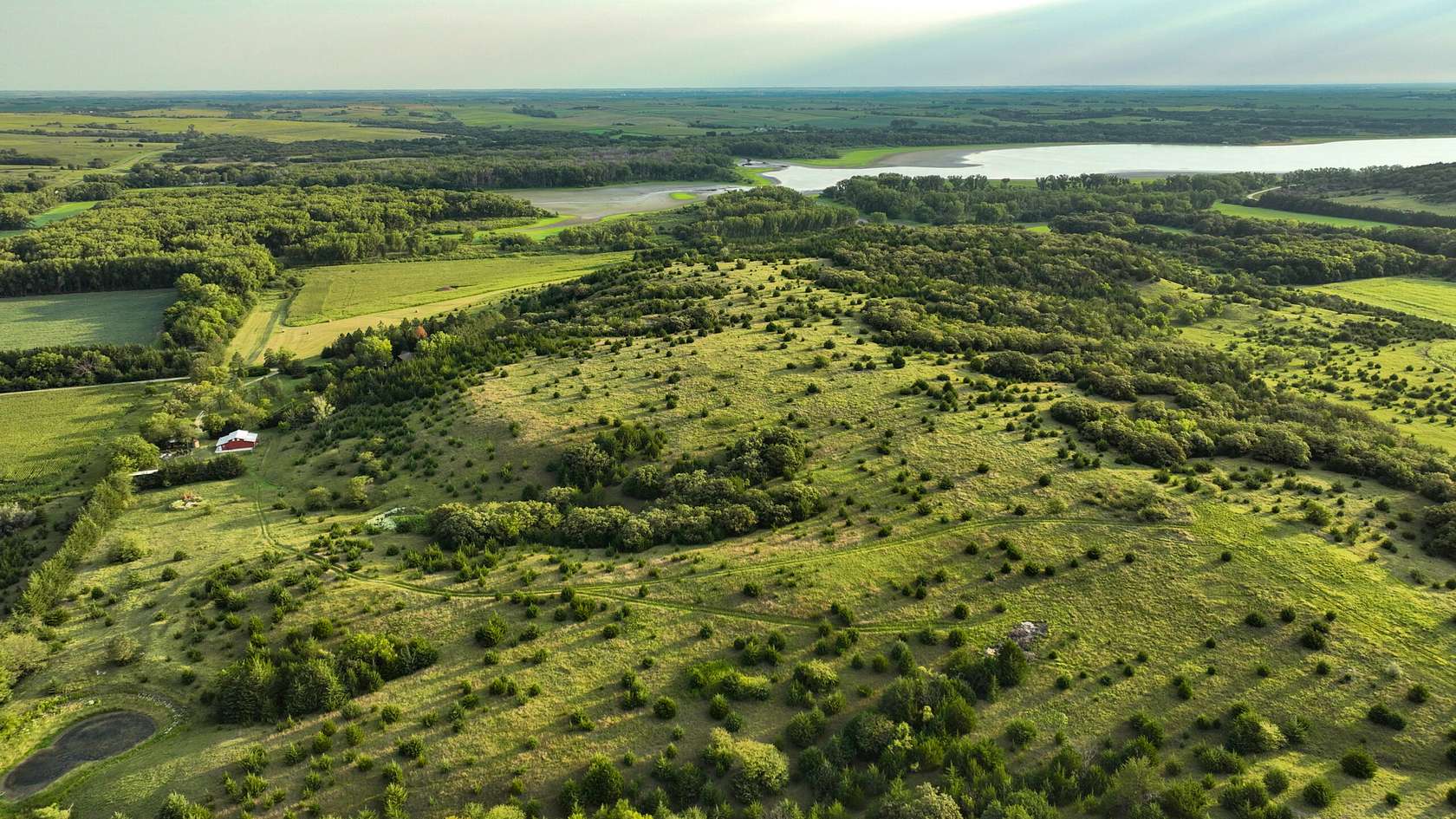 117 Acres of Recreational Land with Home for Sale in Mankato, Kansas