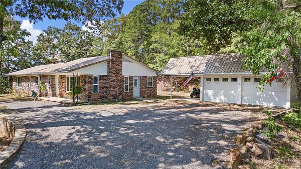 10 Acres of Land with Home for Sale in Belleville, Arkansas