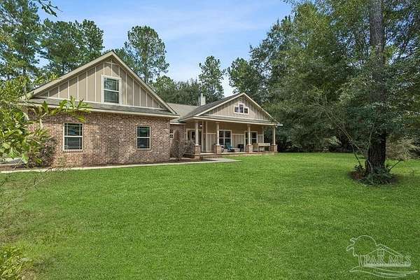 5.16 Acres of Land with Home for Sale in Milton, Florida