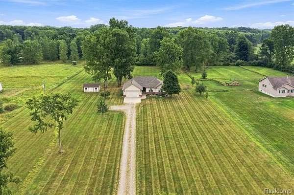 3 Acres of Land with Home for Sale in Columbus Township, Michigan