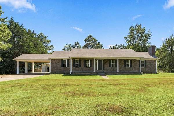 5 Acres of Land with Home for Sale in Florence, Alabama