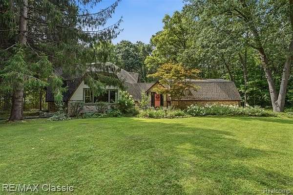 3.9 Acres of Land with Home for Sale in Highland Township, Michigan