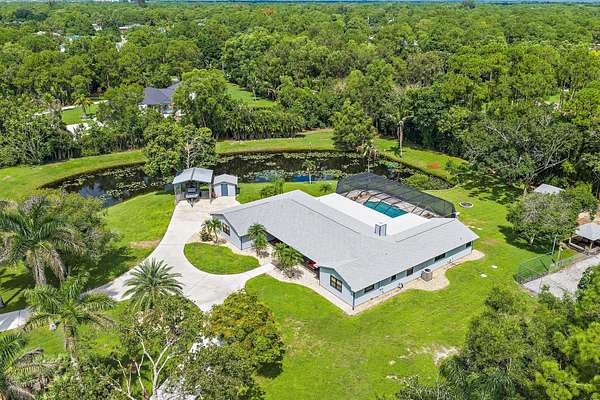2.5 Acres of Land with Home for Sale in Jupiter, Florida