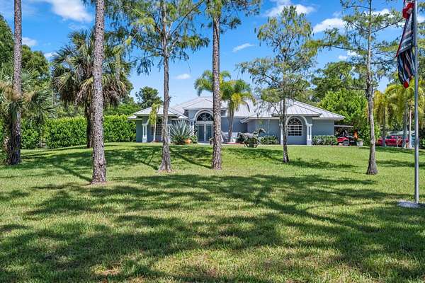 5 Acres of Land with Home for Sale in Loxahatchee Groves, Florida