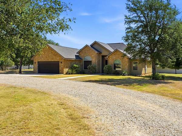 2.78 Acres of Land with Home for Sale in Center Point, Texas