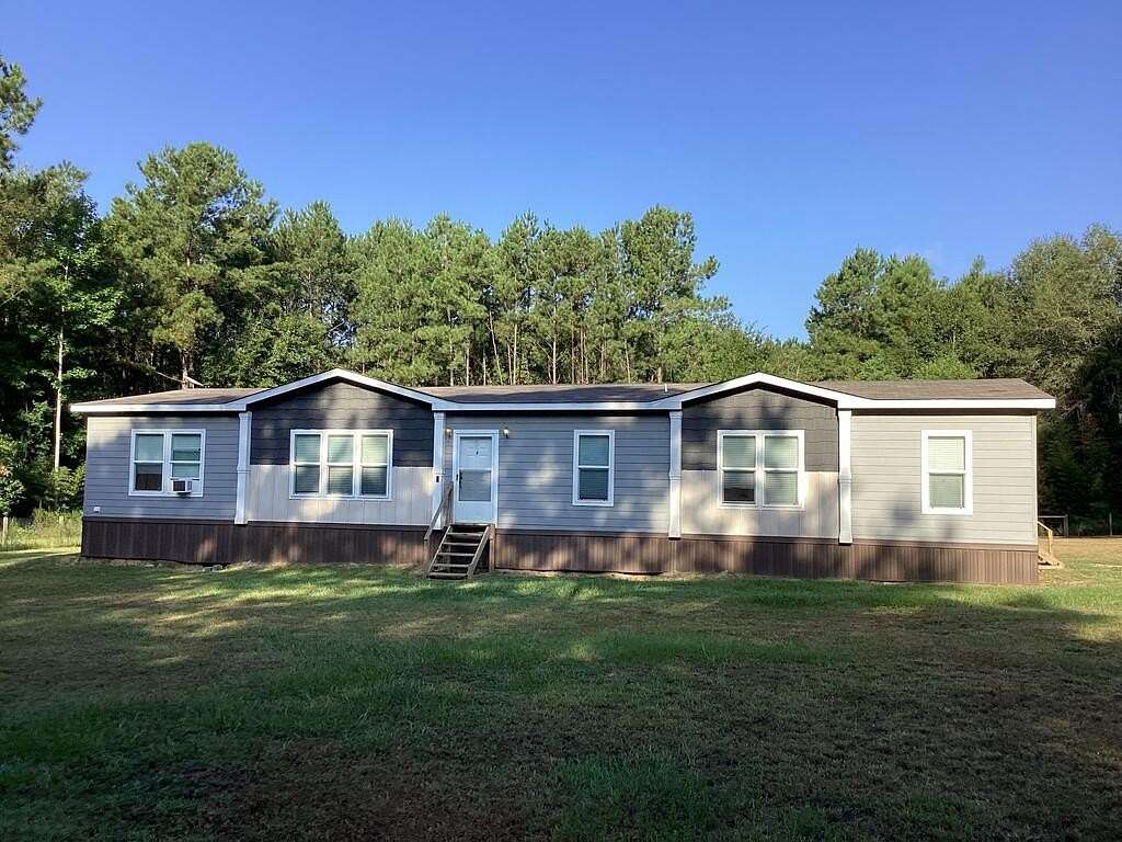 24.7 Acres of Recreational Land with Home for Sale in Kirbyville, Texas