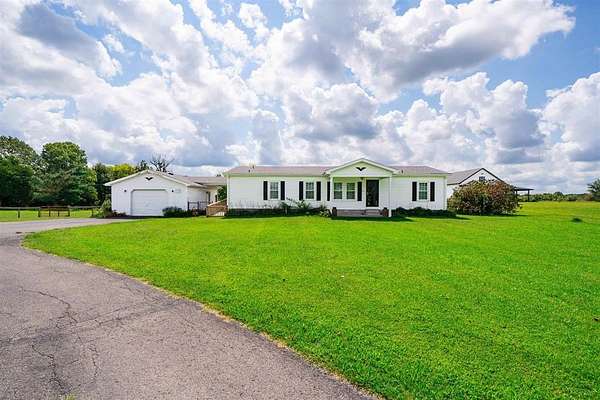 1.5 Acres of Land with Home for Sale in Caneyville, Kentucky