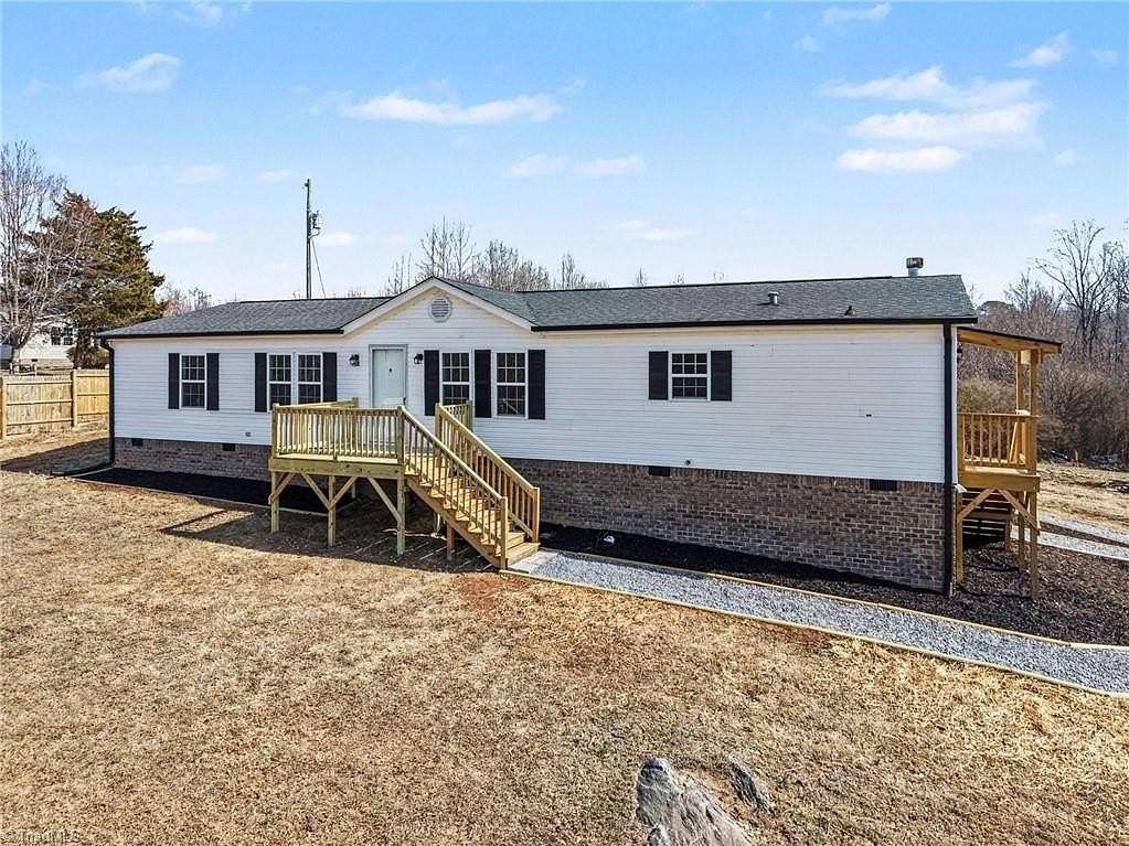 6 Acres of Land with Home for Sale in Staley, North Carolina