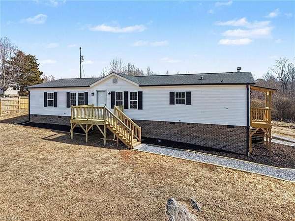 6 Acres of Land with Home for Sale in Staley, North Carolina