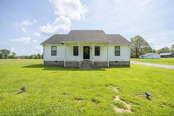 1.7 Acres of Land with Home for Sale in Selmer, Tennessee