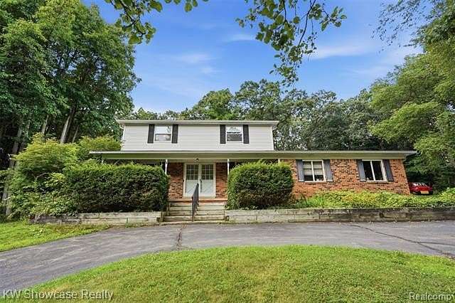 2 Acres of Land with Home for Sale in Springfield Township, Michigan