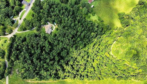 10.7 Acres of Recreational Land with Home for Sale in Cumberland City, Tennessee