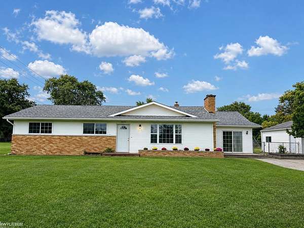 1.5 Acres of Land with Home for Sale in Clyde Township, Michigan