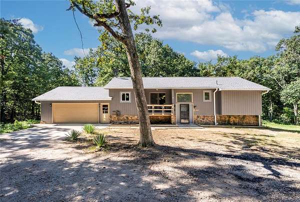5 Acres of Land with Home for Sale in Gravette, Arkansas