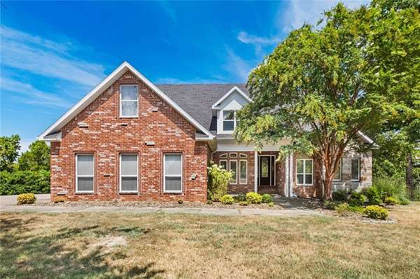 2.5 Acres of Land with Home for Sale in Lowell, Arkansas