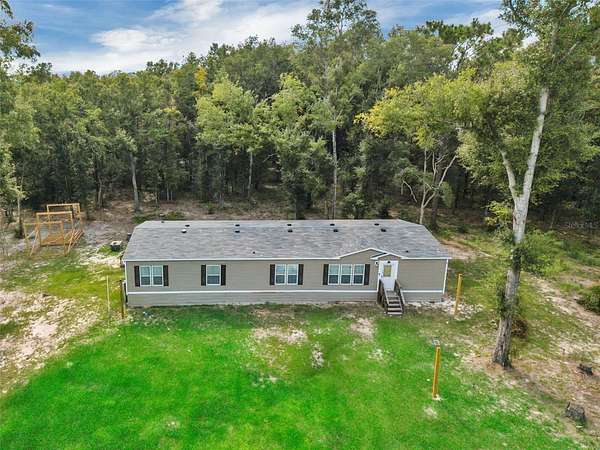 5 Acres of Land with Home for Sale in Lake City, Florida