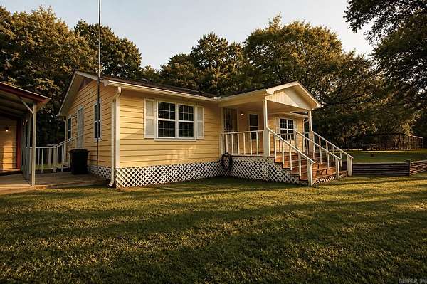 4.4 Acres of Land with Home for Sale in Rockport, Arkansas