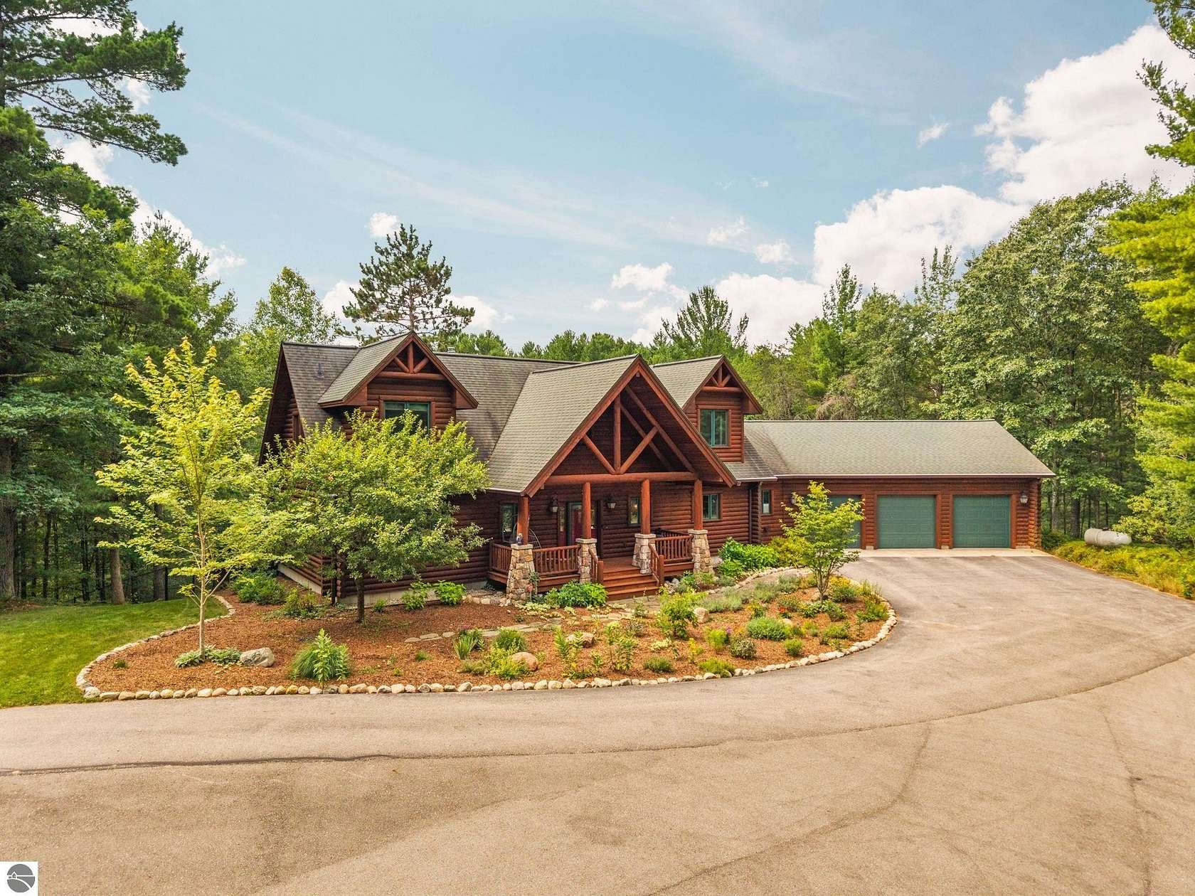 10 Acres of Recreational Land with Home for Sale in Williamsburg, Michigan
